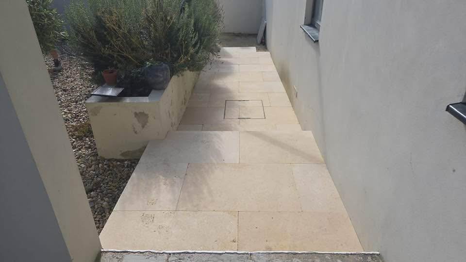 Finished stone pathway with drainage access